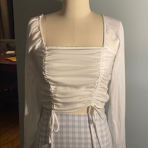 Smocked backed blous.  square neck. Adjustable